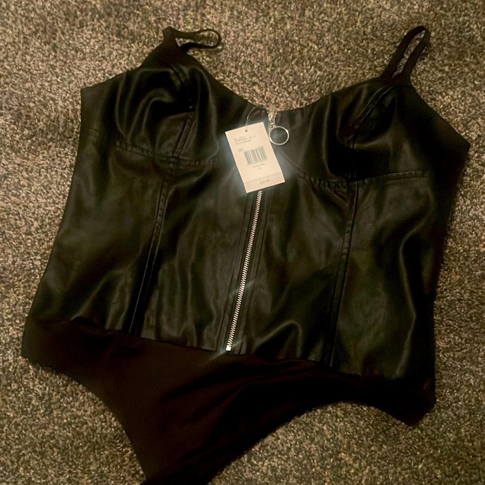 Guess New body suit size L. With tags.